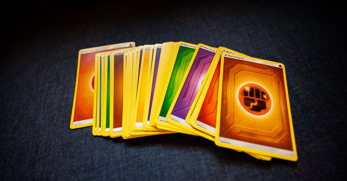 Can I buy a Graphics card in the US and bring it back to EU? - From above of colorful pack of trading cards for game placed on gray surface Can I buy a Graphics card in the US and bring it back to EU? - From above of colorful pack of trading cards for game placed on gray surface