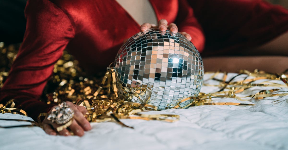 Can I carry my queen size bed in train as an extra luggage/parcel? - Crop anonymous male in red velvet dress of drag queen lying on bed with glass disco ball Can I carry my queen size bed in train as an extra luggage/parcel? - Crop anonymous male in red velvet dress of drag queen lying on bed with glass disco ball