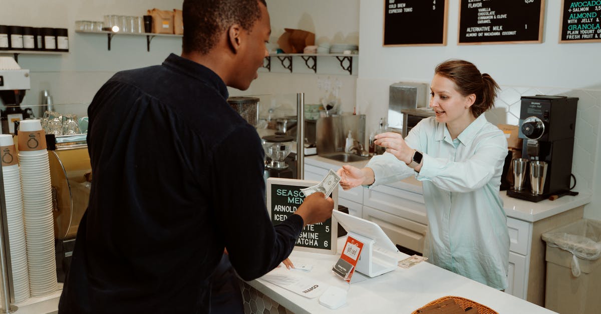 Can I change itinerary after getting a visa? - A Woman Receiving Money from the Customer Can I change itinerary after getting a visa? - A Woman Receiving Money from the Customer