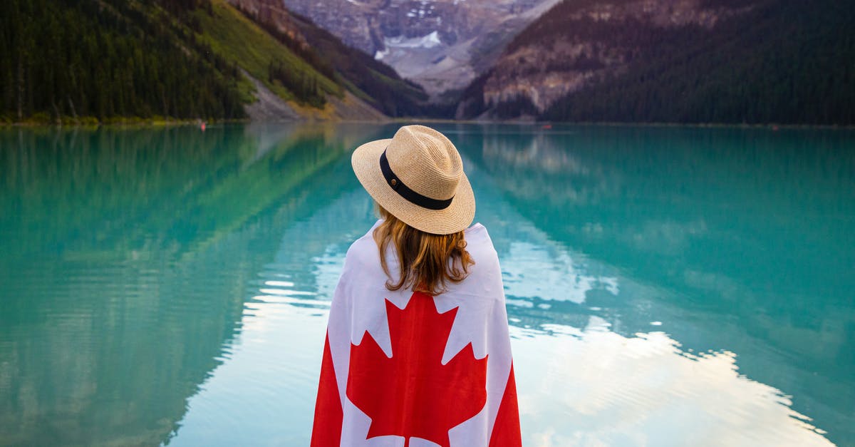 Can I come back to Canada with an expired passport? - Photo of Woman Standing Near the Lake Can I come back to Canada with an expired passport? - Photo of Woman Standing Near the Lake