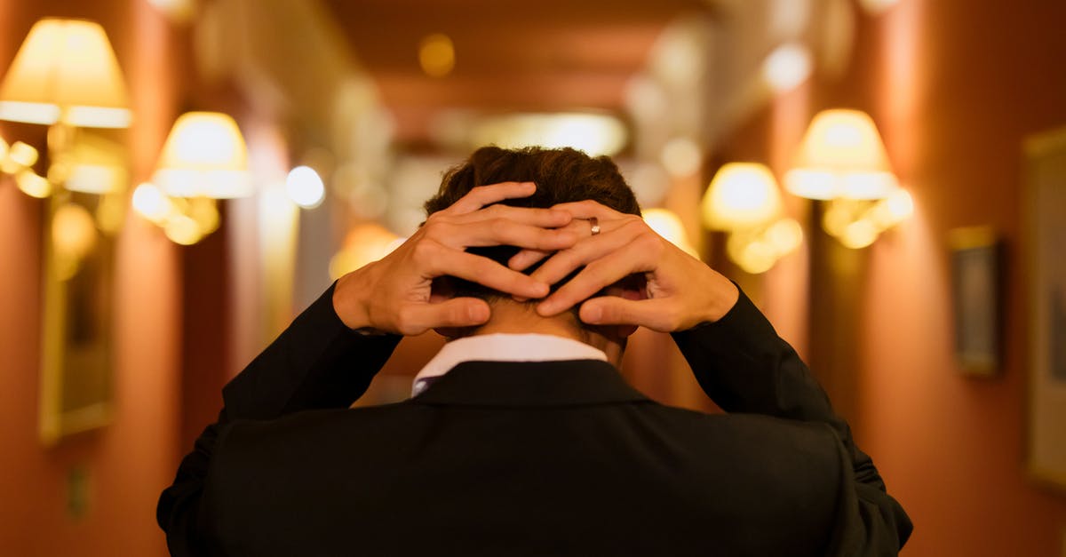 Can I demand my passport back in the middle of an application for a Chinese Visa in the UK? - Man in Black Suit Jacket with Hands on His Head Can I demand my passport back in the middle of an application for a Chinese Visa in the UK? - Man in Black Suit Jacket with Hands on His Head