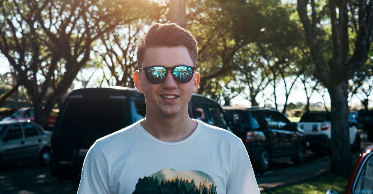 Can I drive up to the General Sherman (sequoia tree) general parking lot in a 30-foot RV and can I park it there during COVID-19 pandemic? - Man Wearing White and Black Bear Printed Shirt and Sunglasses