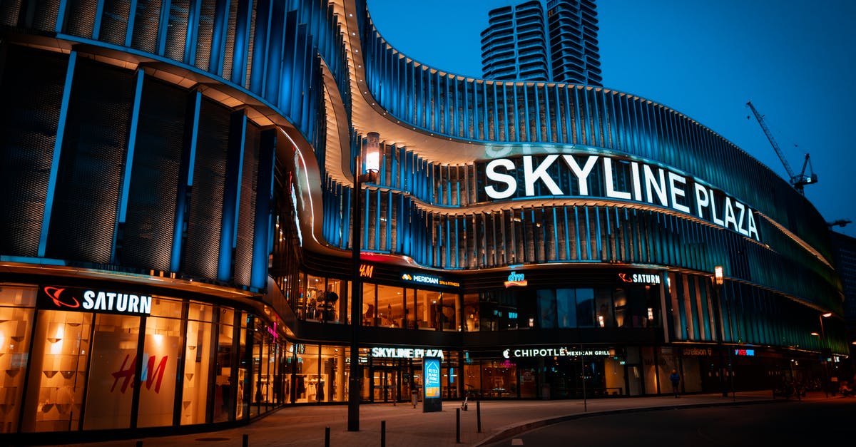 Can I enter Germany first with my Estonian Schengen visa? [duplicate] - Bright majestic snaking building at night