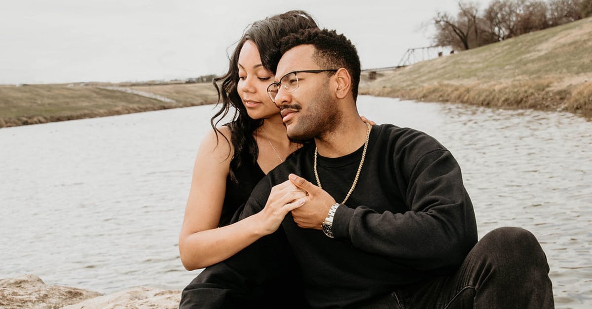 Can I enter the UK without my husband if we said we'd travel together in our visa application? - Man and Woman Holding Hands Together