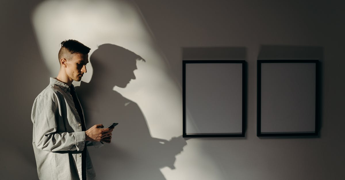 Can I extend my duration of stay in my UK visitor visa? - Man in White Dress Shirt Standing Near Wall Can I extend my duration of stay in my UK visitor visa? - Man in White Dress Shirt Standing Near Wall