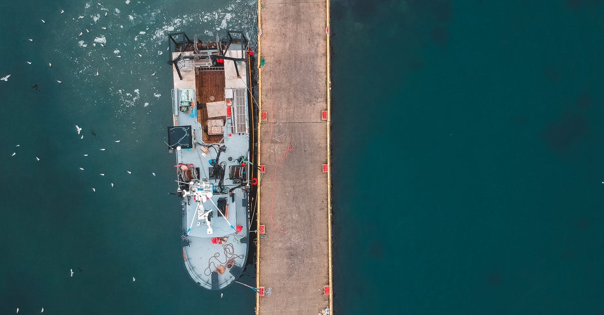 Can I fly from Malaysia to Singapore airport without a visa, assuming I don't pass immigration and fly straight back? - Aged motor boat moored on sea near dock Can I fly from Malaysia to Singapore airport without a visa, assuming I don't pass immigration and fly straight back? - Aged motor boat moored on sea near dock