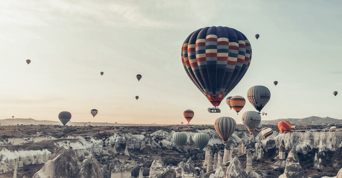 Can I fly to (board) Turkey without passport? - Multicolored hot air balloons flying above famous vast rocky valley in Cappadocia Turkey on early morning on fair weather Can I fly to (board) Turkey without passport? - Multicolored hot air balloons flying above famous vast rocky valley in Cappadocia Turkey on early morning on fair weather