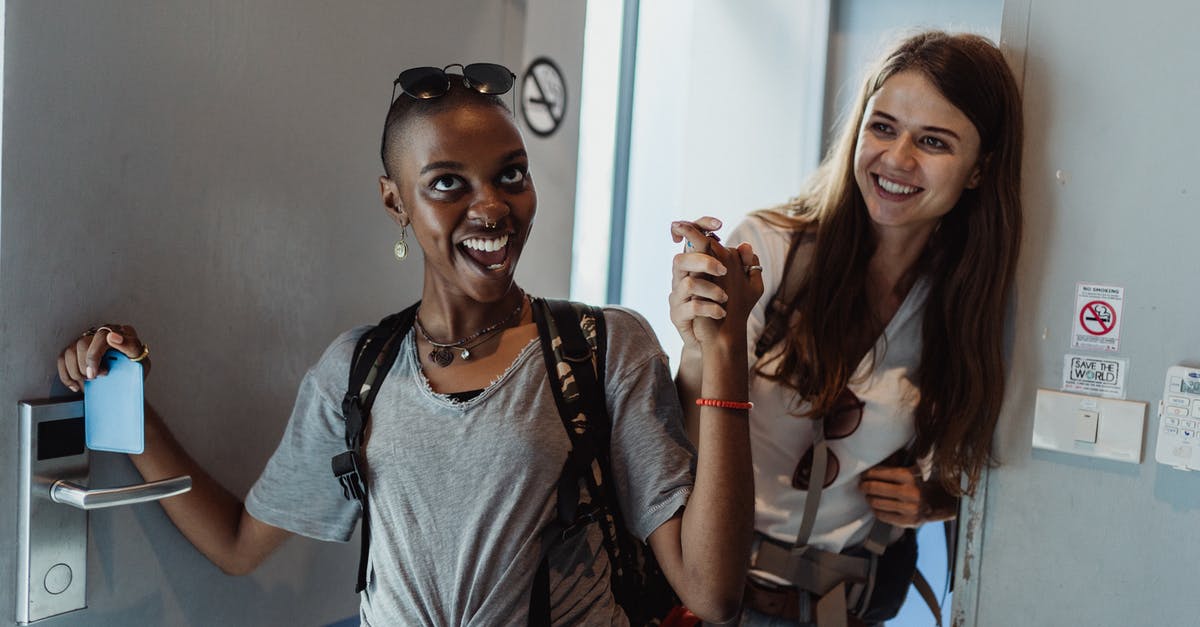 Can I get a French long-stay visa after entering on a short-stay visa? [closed] - Smiling Women in Room
