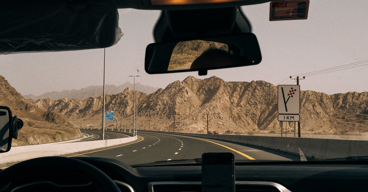 Can I get a Saudi Arabian transit visa if driving from UAE to Jordan by car? - View from Inside the Car on Hajar Mountains in United Arab Emirates Can I get a Saudi Arabian transit visa if driving from UAE to Jordan by car? - View from Inside the Car on Hajar Mountains in United Arab Emirates