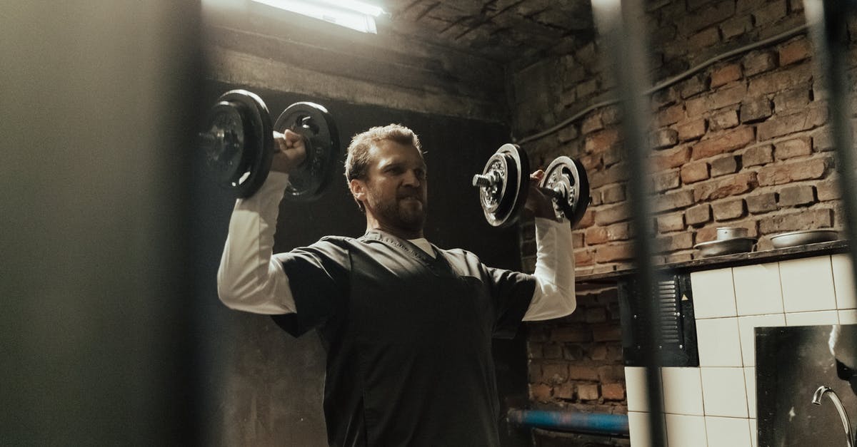 Can I get arrested for loitering? - Man in Gray Crew Neck T-shirt Holding Black Kettle Bell Can I get arrested for loitering? - Man in Gray Crew Neck T-shirt Holding Black Kettle Bell