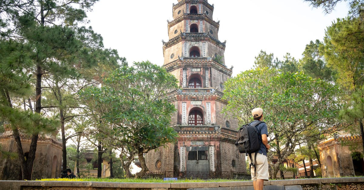 Can I get visas to travel from Vietnam to the UK and go to Australia and then go back to Vietnam? - Unrecognizable male tourist walking in park and sightseeing old pagoda Can I get visas to travel from Vietnam to the UK and go to Australia and then go back to Vietnam? - Unrecognizable male tourist walking in park and sightseeing old pagoda