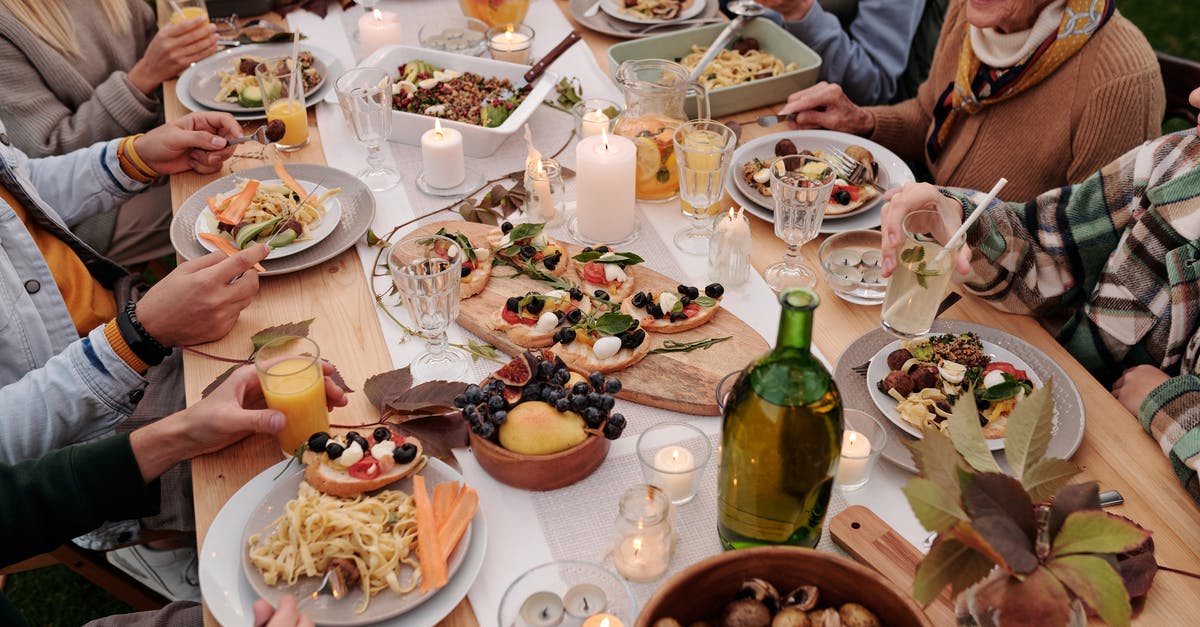 Can I go to Germany for a family reunion apply, right after an overstay? - From above crop people enjoying festive dinner with snacks at garden table with candles burning Can I go to Germany for a family reunion apply, right after an overstay? - From above crop people enjoying festive dinner with snacks at garden table with candles burning