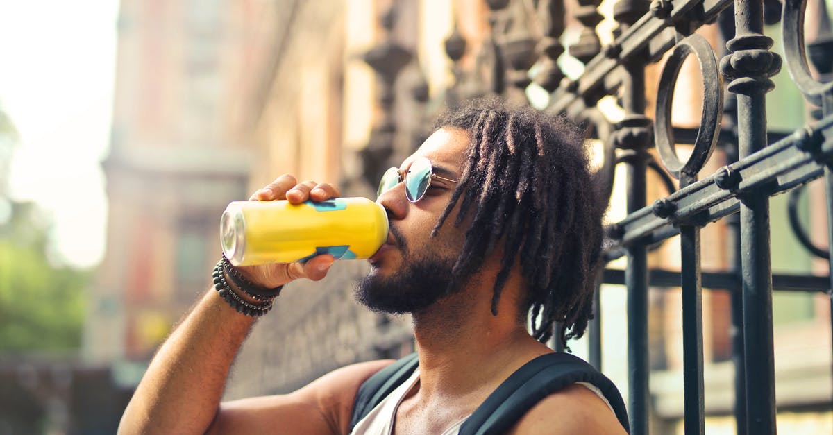 Can I go to UK holding an accompanied visa, unaccompanied - Photo of Man Drinking Can I go to UK holding an accompanied visa, unaccompanied - Photo of Man Drinking