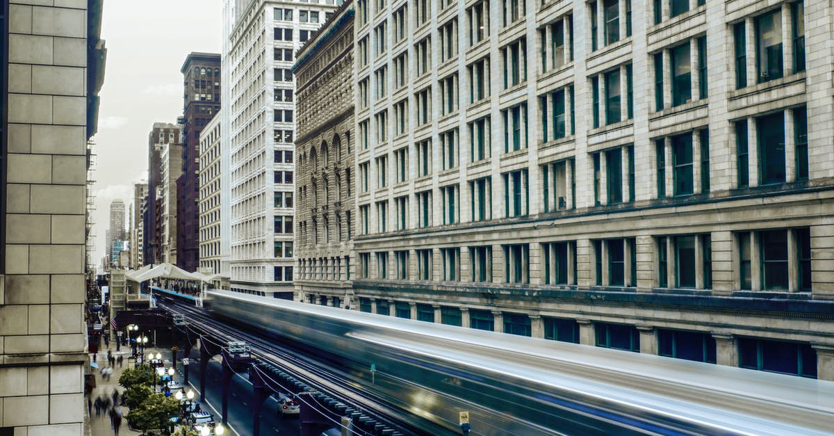 Can I leave Chicago (ORD) on a 10 hour layover - Time Lapse Photo of White Train Passing by Buildings Can I leave Chicago (ORD) on a 10 hour layover - Time Lapse Photo of White Train Passing by Buildings