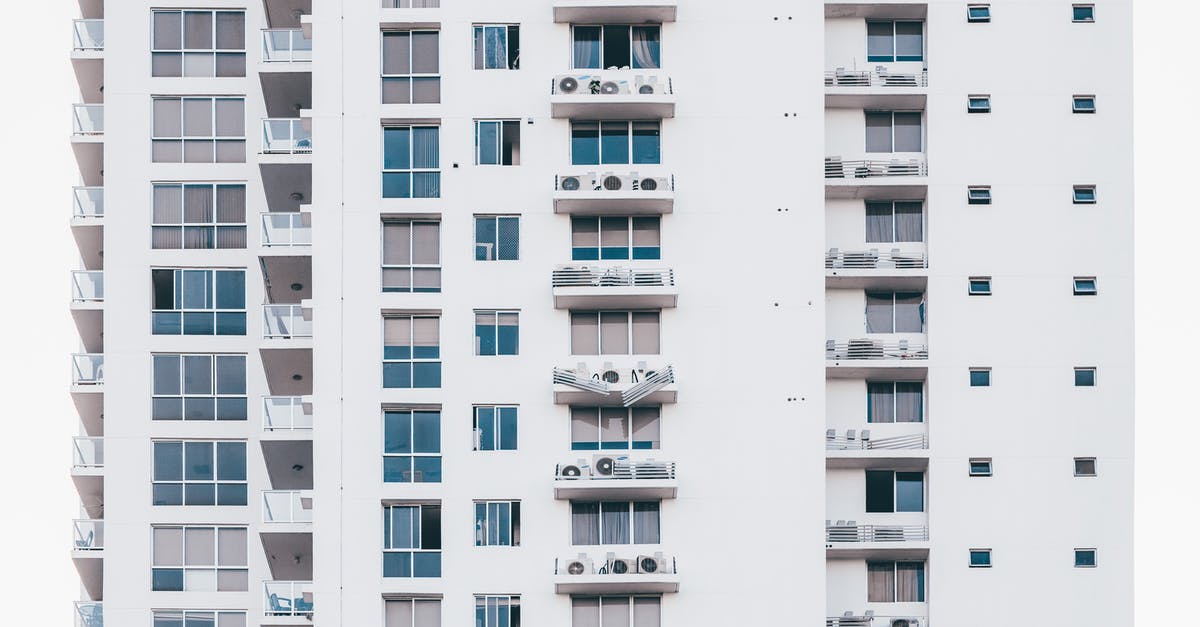 Can I leave Switzerland while awaiting work and residence permit? [closed] - Minimalist Photography of White and Gray Condominium