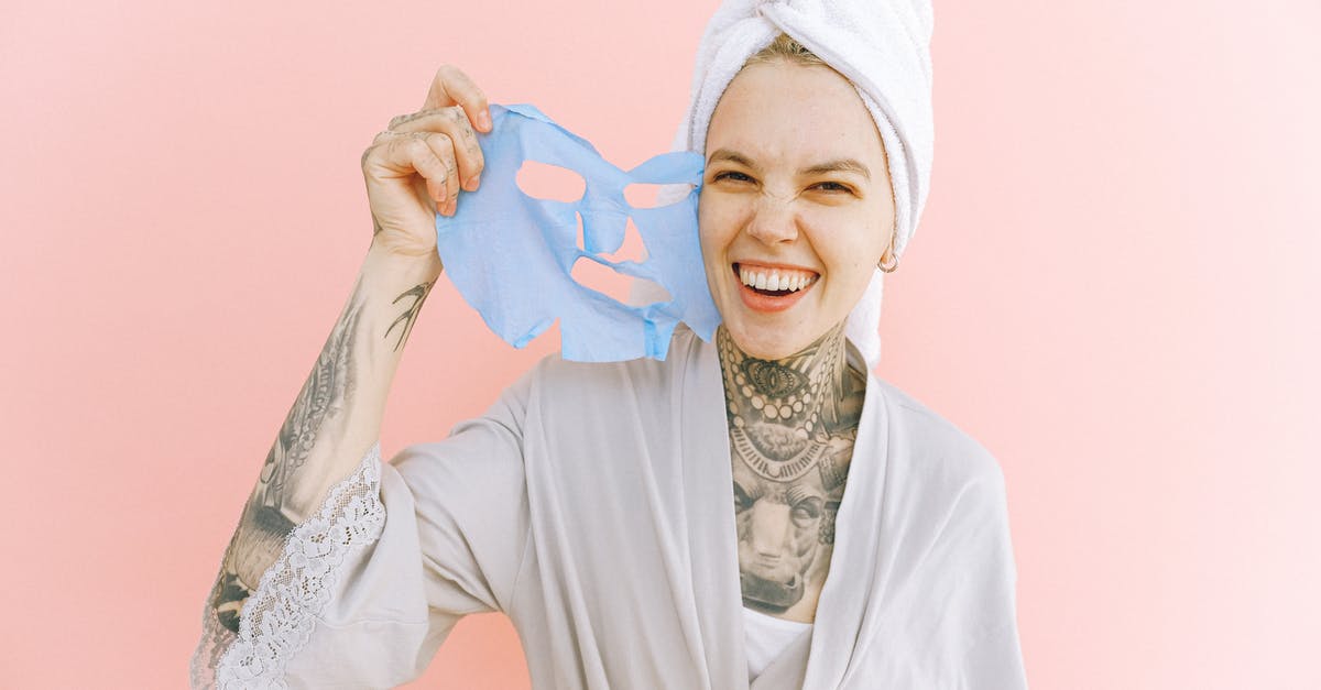 Can I legally remove my mask once my train cross the Italian-Swiss border? - Happy woman removing face mask after taking bath Can I legally remove my mask once my train cross the Italian-Swiss border? - Happy woman removing face mask after taking bath