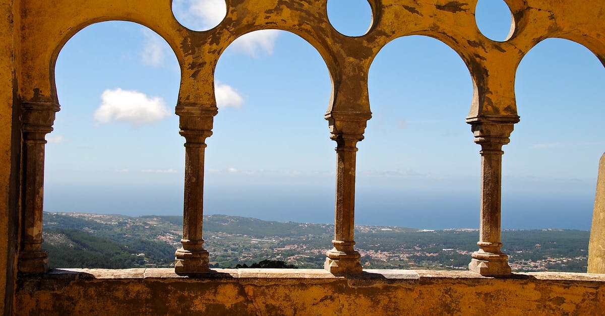 Can I obtain a IEC Working Holiday Visa Canada as a Dual Citizen of the U.S. and Portugal - Grey Concrete 3 Baluster Near Mountains and Sea during Daytime Can I obtain a IEC Working Holiday Visa Canada as a Dual Citizen of the U.S. and Portugal - Grey Concrete 3 Baluster Near Mountains and Sea during Daytime