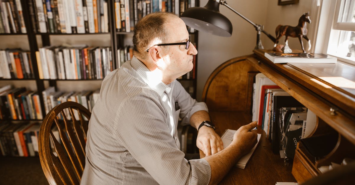 Can I pay online if I first book with "pay at property" option? - Man in White and Gray Pinstripe Dress Shirt Sitting on Brown Wooden Chair Can I pay online if I first book with "pay at property" option? - Man in White and Gray Pinstripe Dress Shirt Sitting on Brown Wooden Chair