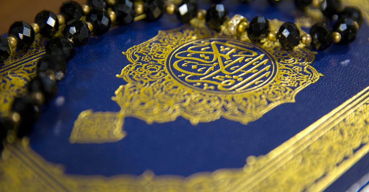 Can I perform Umrah while on a Saudi Arabian visit e-visa - Close-Up Shot of Prayer Beads on a Book Can I perform Umrah while on a Saudi Arabian visit e-visa - Close-Up Shot of Prayer Beads on a Book