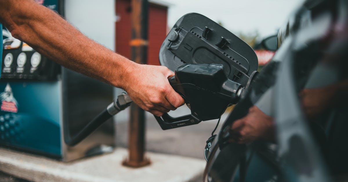 Can I pump my own gas in New Jersey, USA? - Person Putting Gasoline on a Vehicle Can I pump my own gas in New Jersey, USA? - Person Putting Gasoline on a Vehicle