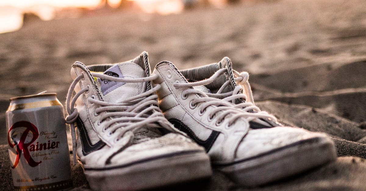 Can I really "wear" my luggage? - White High-top Vans Sneakers And Tin Can Can I really "wear" my luggage? - White High-top Vans Sneakers And Tin Can