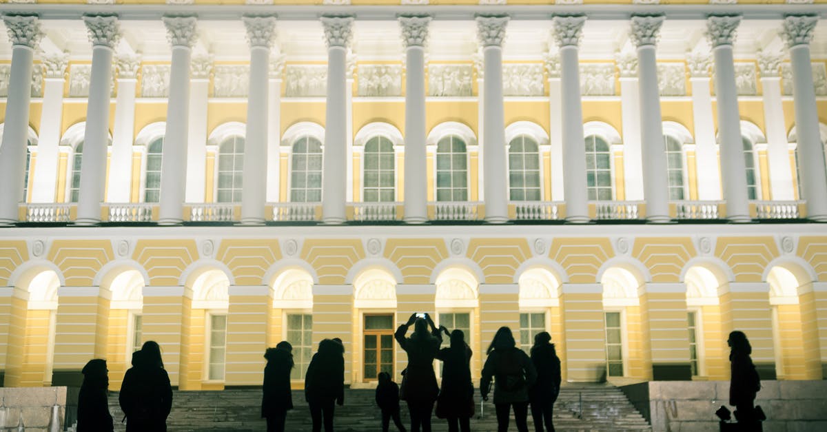 Can I register a Private visa in Russia though not staying with the person who issued the invitation? - People Photographing the Facade of The State Russian Museum