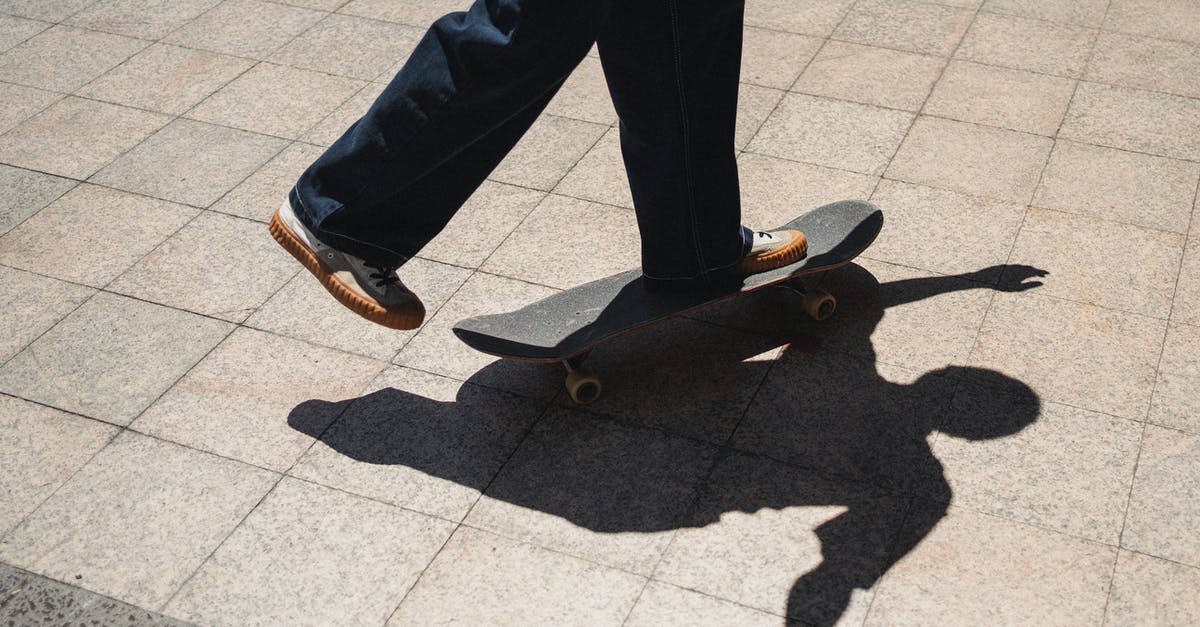 Can I roller skate on the street in France? - Crop skater riding skateboard on sidewalk Can I roller skate on the street in France? - Crop skater riding skateboard on sidewalk