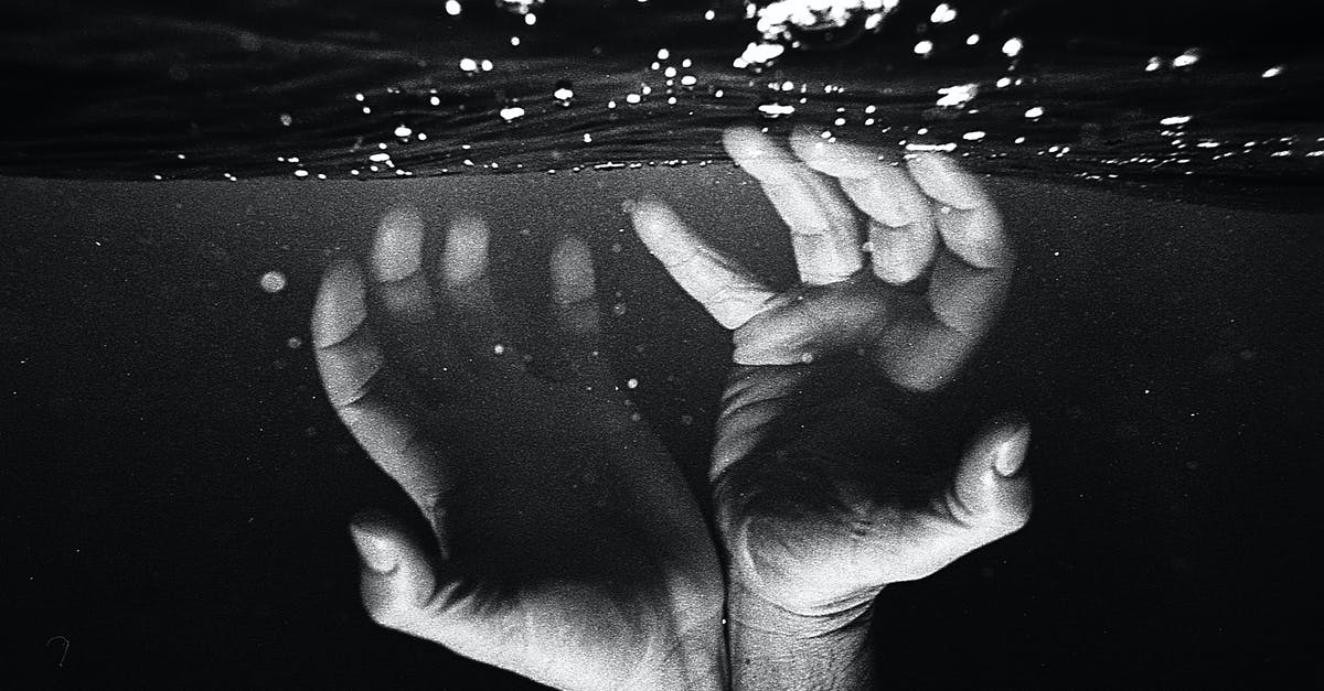 Can I seek help from UK embassy as ONLY a resident? - Hands of crop faceless man under water Can I seek help from UK embassy as ONLY a resident? - Hands of crop faceless man under water