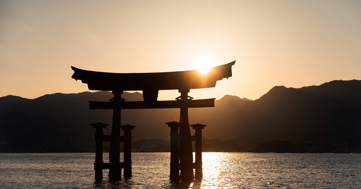 Can I stay overnight [15-hour layover] in Haneda airport without a Japan visa? - 
A Silhouette of the Itsukushima Shrine in Japan