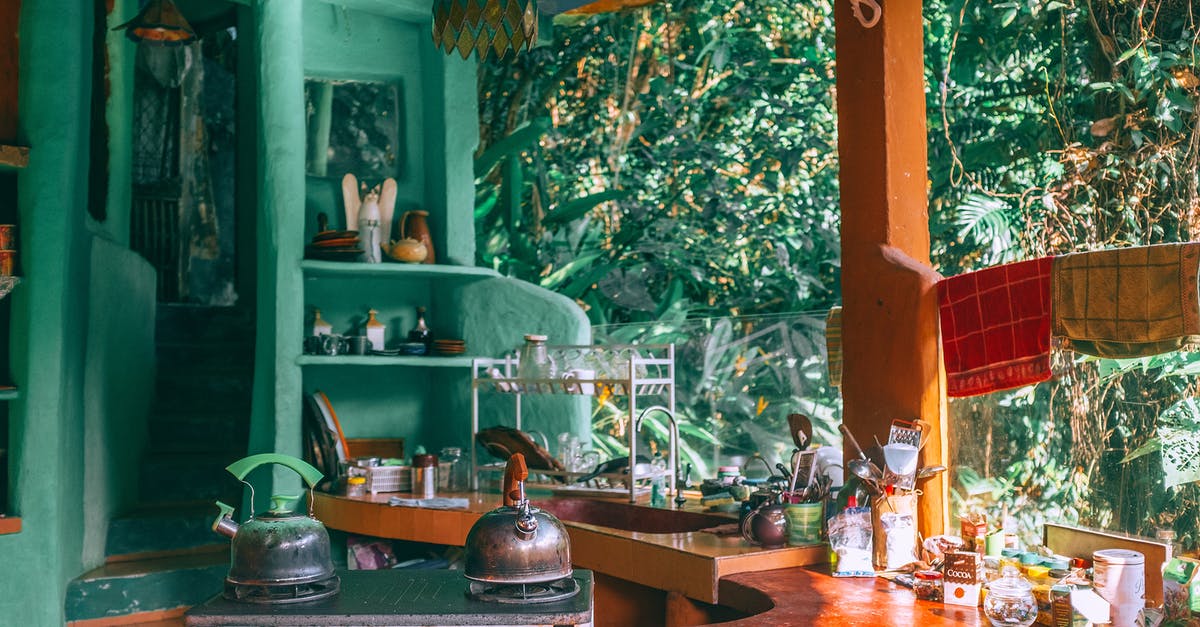 Can I take a small aluminum drying rack on plane? - Metal kettles on portable stove in kitchen Can I take a small aluminum drying rack on plane? - Metal kettles on portable stove in kitchen