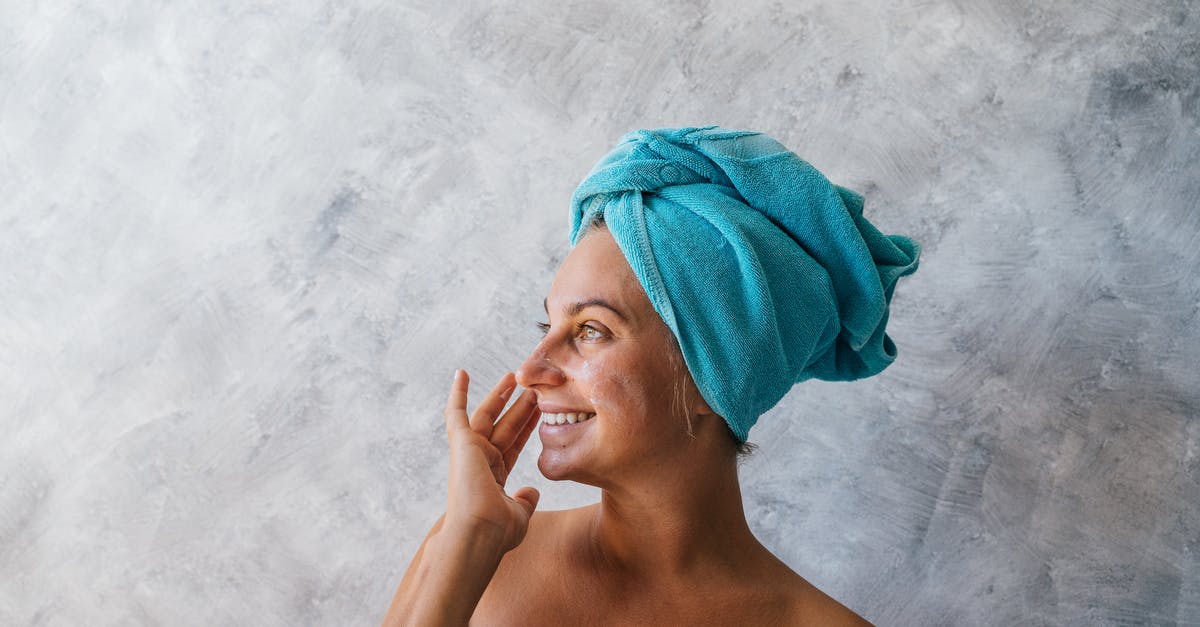 Can I take a wrapped gift of skin care products with me on the airplane? - A Woman with Towel on Head Applying Facial Cream Can I take a wrapped gift of skin care products with me on the airplane? - A Woman with Towel on Head Applying Facial Cream