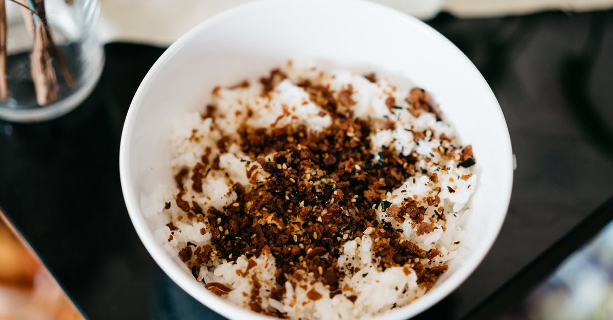Can I take chocolate and toffees into China, South Korea and Japan - White Ceramic Bowl With Brown and Black Food Can I take chocolate and toffees into China, South Korea and Japan - White Ceramic Bowl With Brown and Black Food
