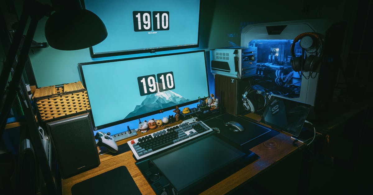 Can I take my gaming computer as luggage? Leaving Saudi Arabia to Malaysia in 27hours [duplicate] - Low-light Photography of Computer Gaming Rig Set