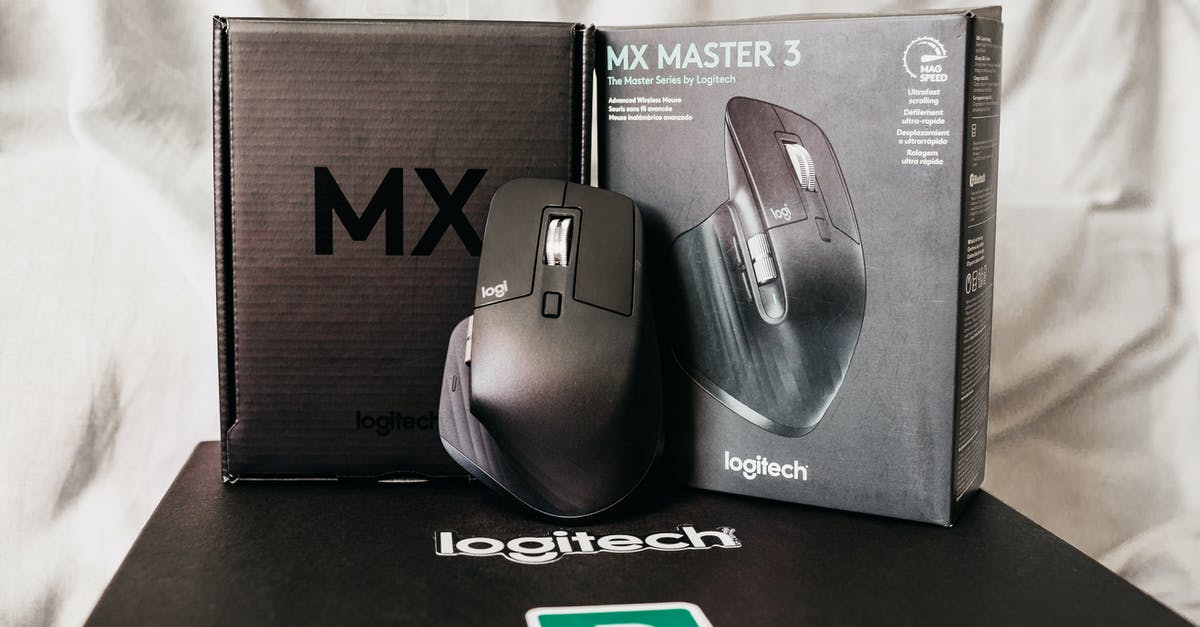 Can I take new (still in their boxes) PC parts in my checked in luggage? - Modern black computer game mouse near box with text of description of functions Can I take new (still in their boxes) PC parts in my checked in luggage? - Modern black computer game mouse near box with text of description of functions