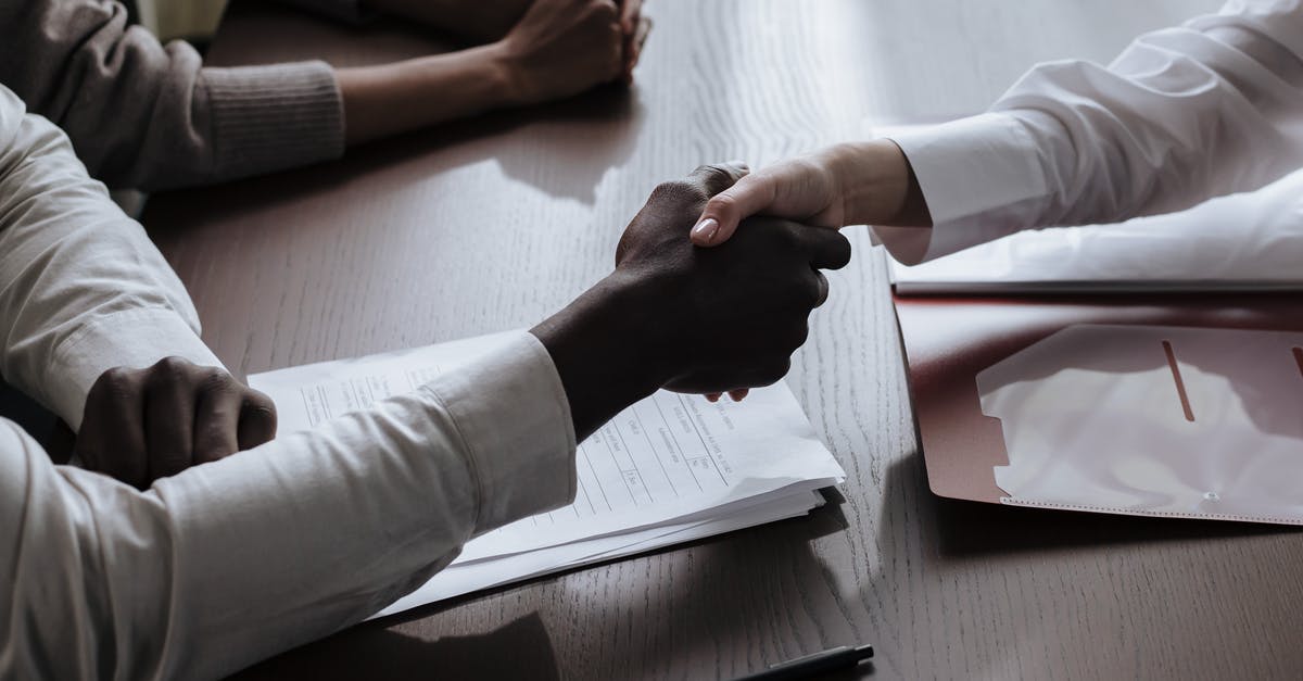 Can I transfer airside between two international tickets at LAX? - Handshake Between Two People Can I transfer airside between two international tickets at LAX? - Handshake Between Two People