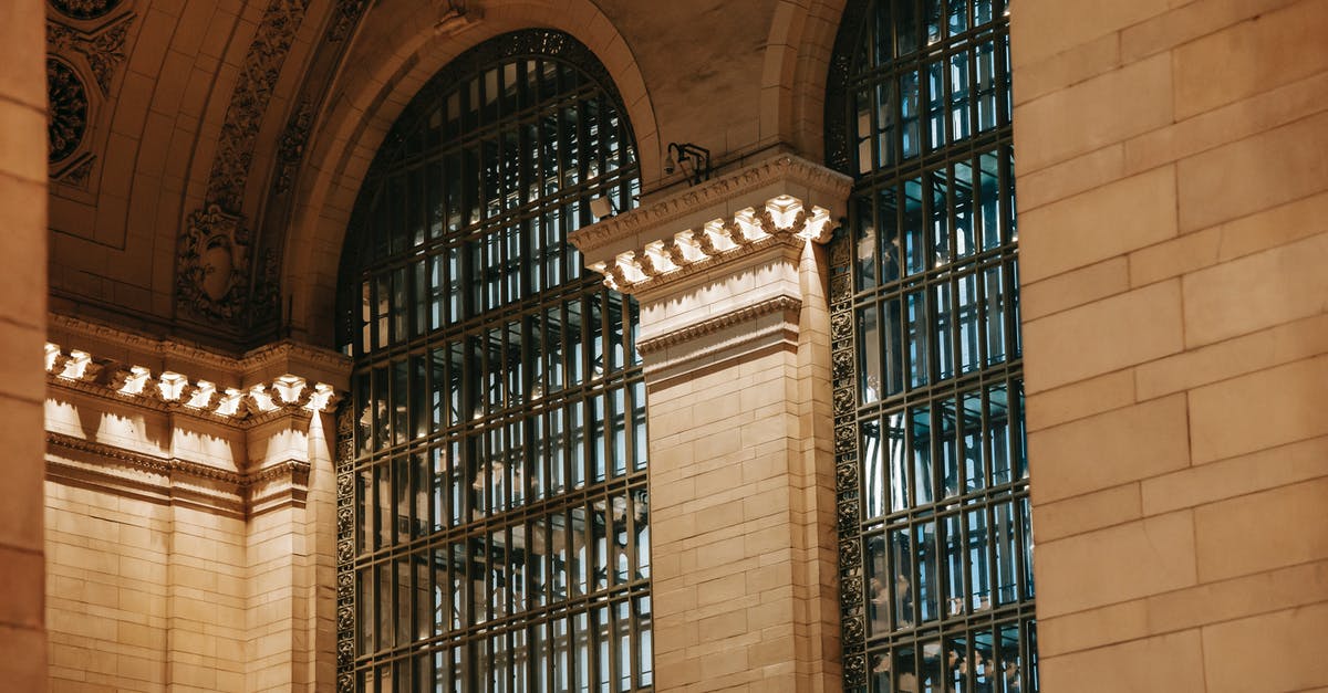 Can I travel from the USA to Spain without buying a round trip ticket? What are my options? [duplicate] - From below of illuminated interior of Grand Central Terminal station with high decorated ceiling and big windows with pillars in New York USA