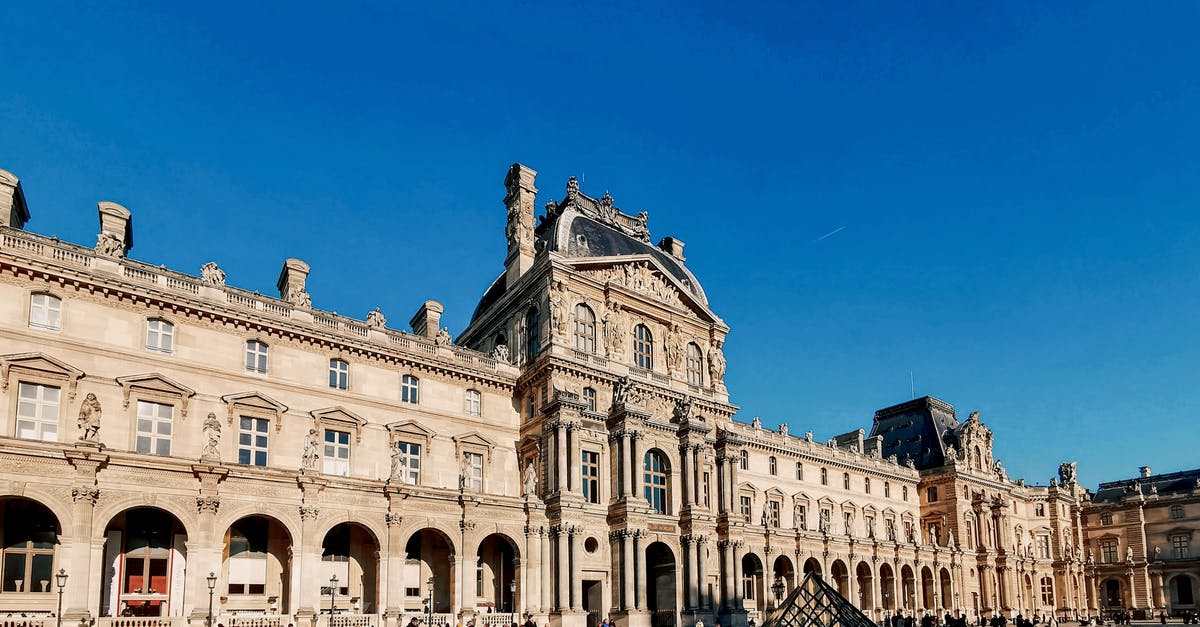 Can I use a visa issued by the Netherlands (Schengen) to travel to Paris as my first entry? [duplicate] - People Walking Near Brown Concrete Building