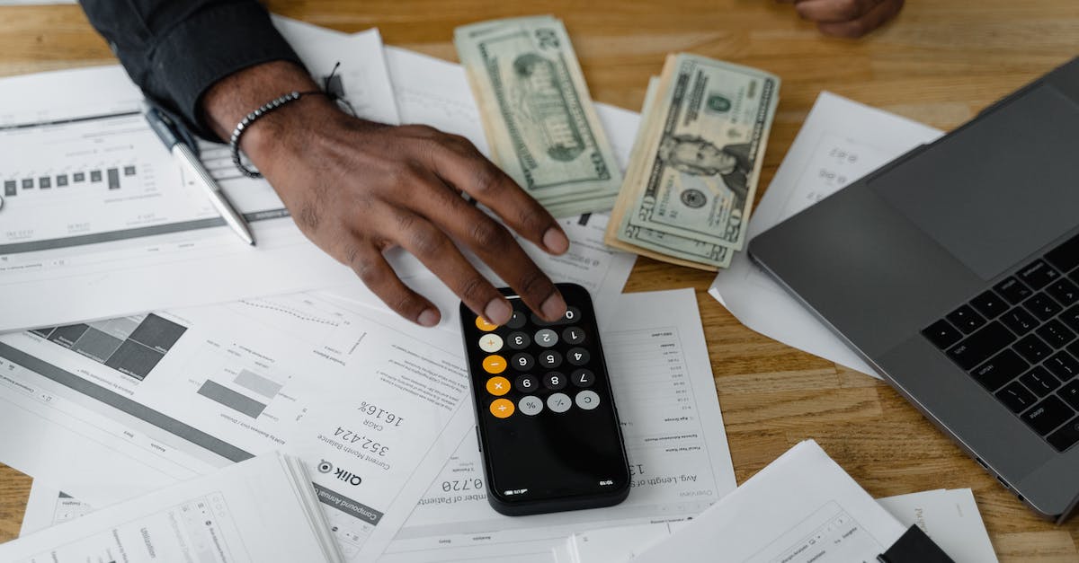Can I use Australian dollars at the Kuala Lumpur airport? - Hand of a Person Using a Calculator Can I use Australian dollars at the Kuala Lumpur airport? - Hand of a Person Using a Calculator