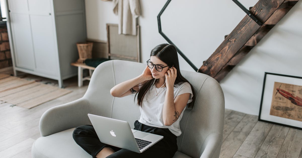Can I use external movie source on Ethopian Airlines 787? - Positive woman using earphones and laptop at home during free time Can I use external movie source on Ethopian Airlines 787? - Positive woman using earphones and laptop at home during free time