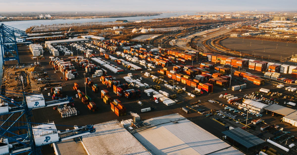 Can I visit a city in the US during layover if my port of entry was a different city? [duplicate] - Large industrial district of modern city