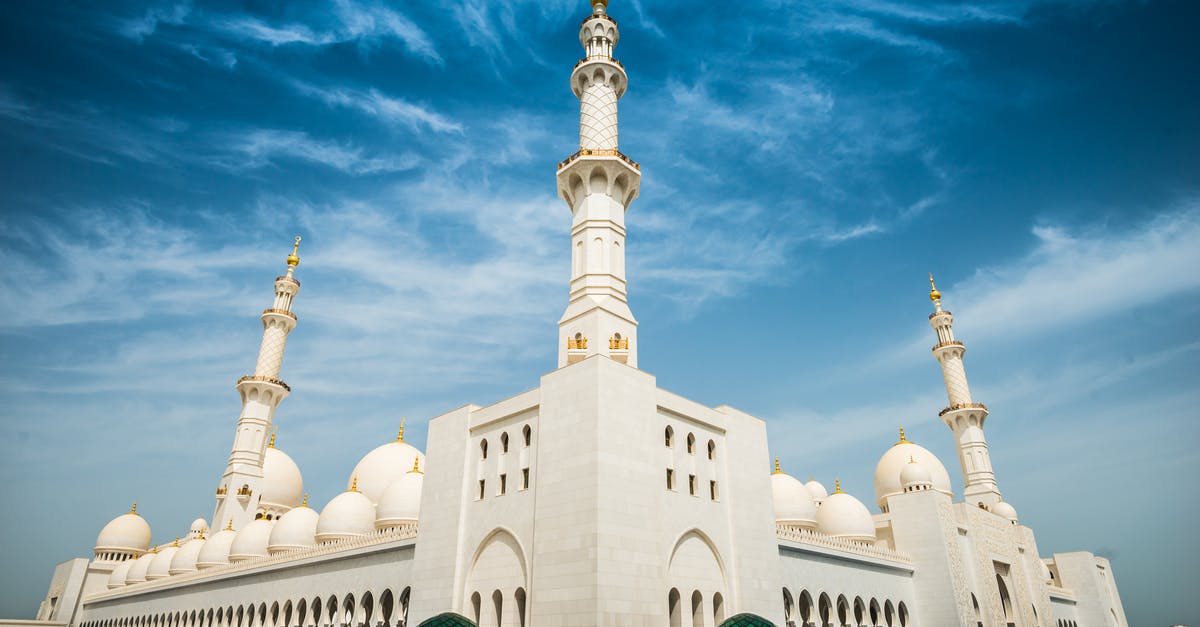 Can Mosques in the UAE be Visited by Non-Muslims? - White Painted Buildings Under Blue Sky Can Mosques in the UAE be Visited by Non-Muslims? - White Painted Buildings Under Blue Sky