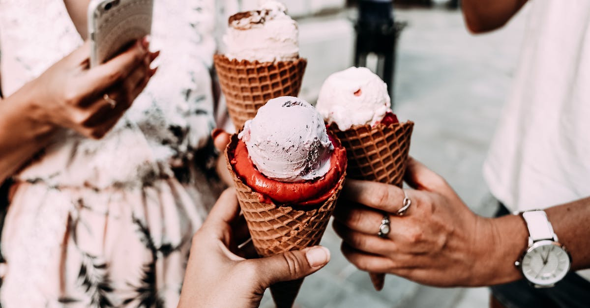 Can my friend and I both use our priority passes to get 2x the amount of free food per person? - Crop anonymous friends in casual summer clothes clinking delicious cone ice creams while gathering on street Can my friend and I both use our priority passes to get 2x the amount of free food per person? - Crop anonymous friends in casual summer clothes clinking delicious cone ice creams while gathering on street