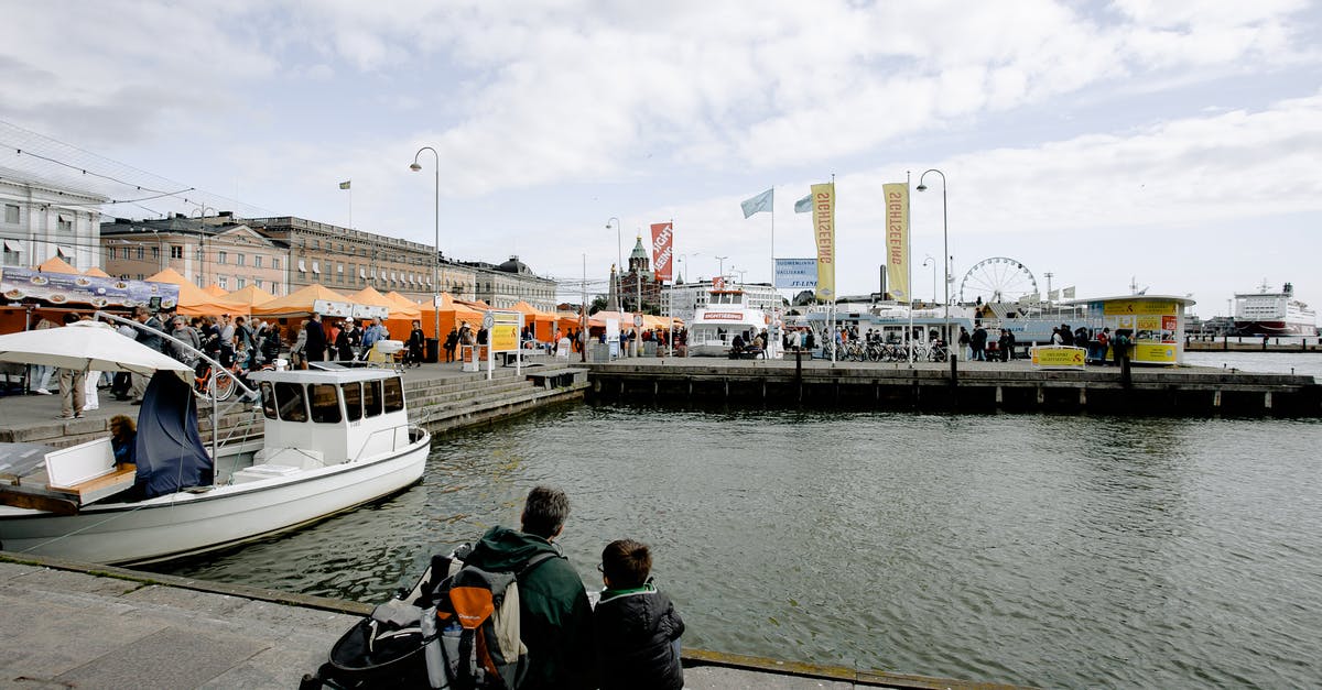 Can my son travel to Denmark while banned from entering Sweden? - Anonymous father with son sitting near lake with motor boat Can my son travel to Denmark while banned from entering Sweden? - Anonymous father with son sitting near lake with motor boat