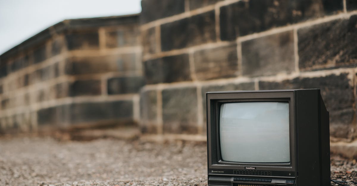 Can NOK and SEK be used interchangeably in the border regions? - Small retro TV on ground near stone barrier