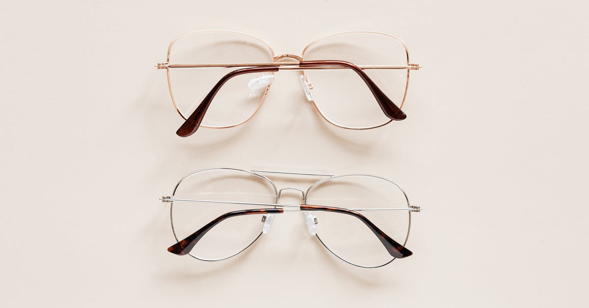 Can one see Morocco from Portugal? - From above of fashion spectacles for vision with golden and silver metal shells placed on white table Can one see Morocco from Portugal? - From above of fashion spectacles for vision with golden and silver metal shells placed on white table