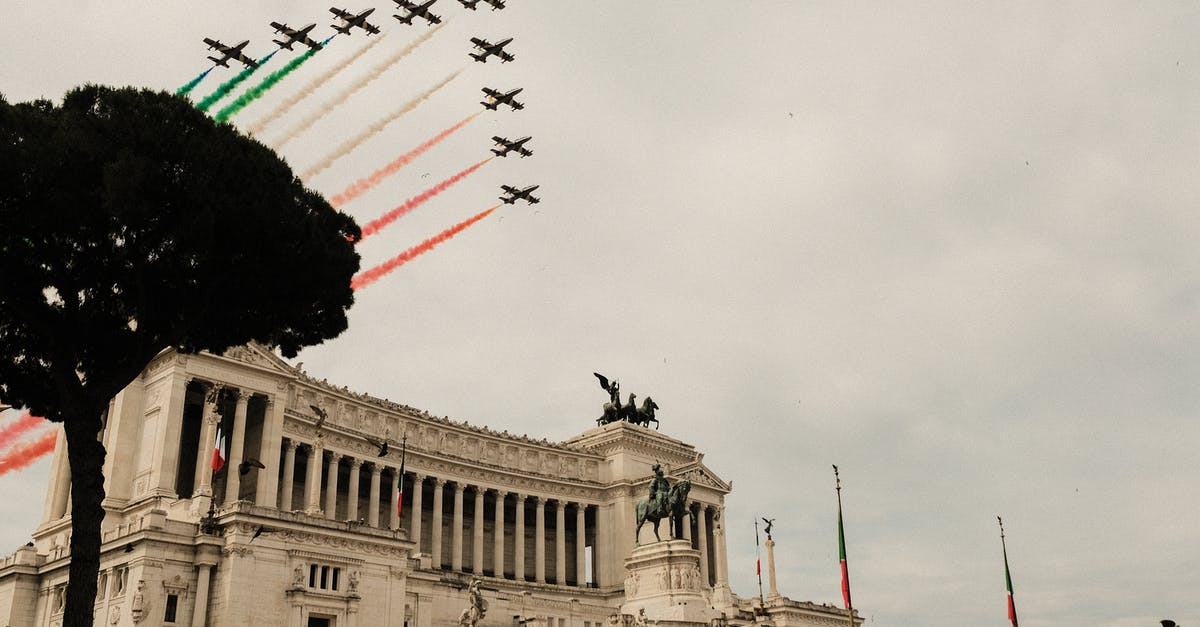 Can one use the 'permesso di soggiorno' to fly from Italy to Paris? [duplicate] - Low angle of air show over Victor Emmanuel Monument with sculptures and colonnade during National Unity and Armed Forces Day in Italy