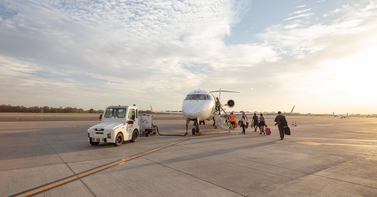 Can passengers visit the flight attendants' sleeping quarters? - People Walking Towards White Plane Can passengers visit the flight attendants' sleeping quarters? - People Walking Towards White Plane