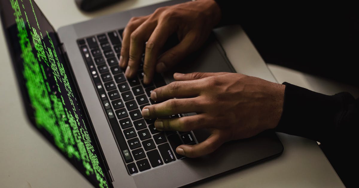 Can the UK access my history in the Schengen Visa Information System? - From above of crop anonymous male hacker typing on netbook with data on screen while sitting at desk Can the UK access my history in the Schengen Visa Information System? - From above of crop anonymous male hacker typing on netbook with data on screen while sitting at desk
