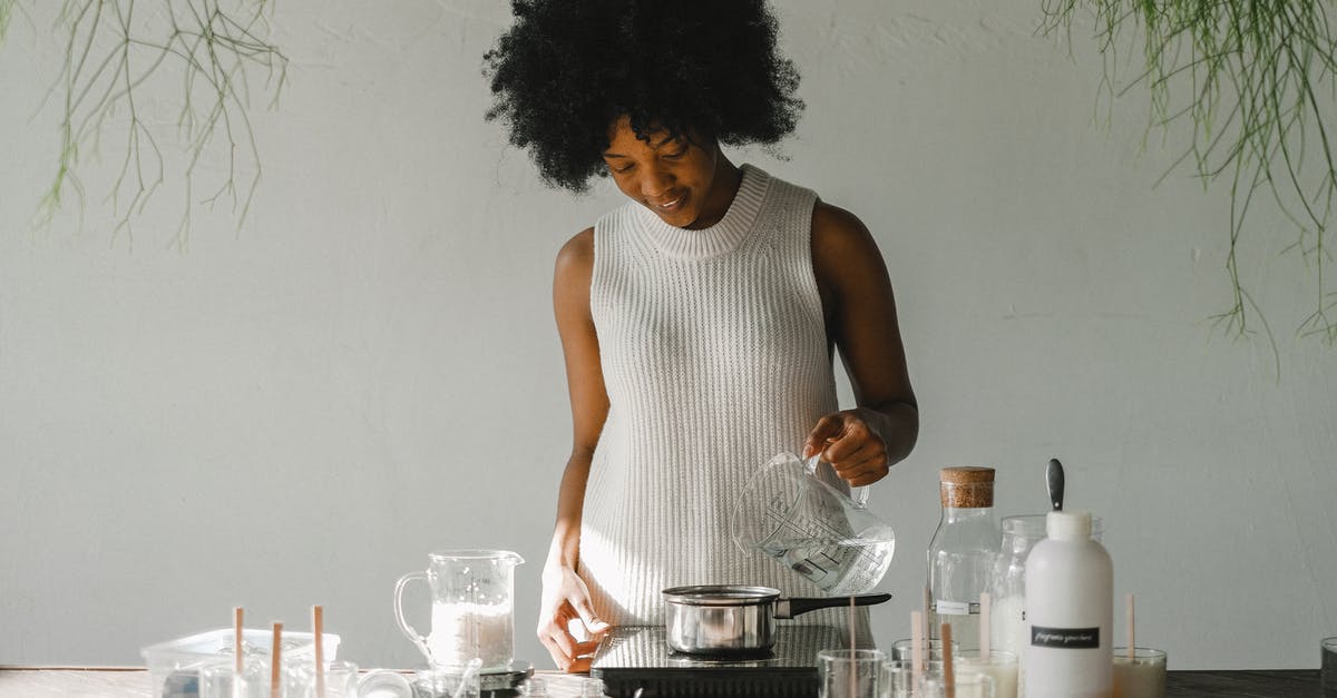 Can visiting saunas make me more prepared for heat in desert and tropics? - Positive African American female artisan pouring liquid in pot while making wax for candles in pot on cooker Can visiting saunas make me more prepared for heat in desert and tropics? - Positive African American female artisan pouring liquid in pot while making wax for candles in pot on cooker