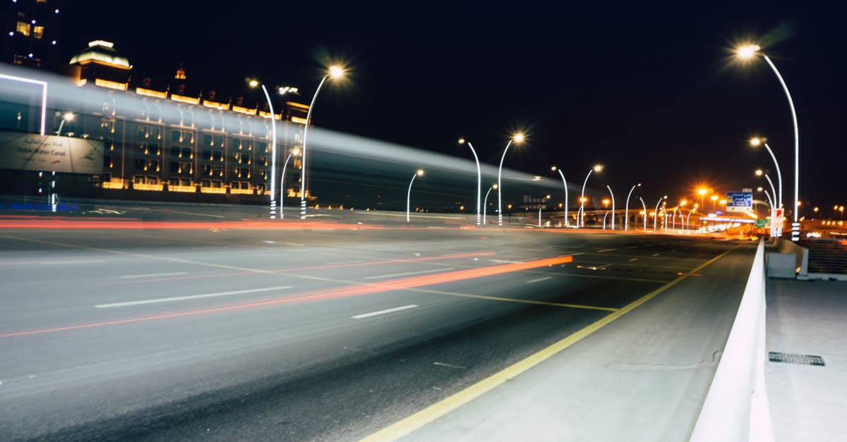 Can we leave the Dubai airport during a long layover; do we need a visa? [duplicate] - Street Lights during Nighttime